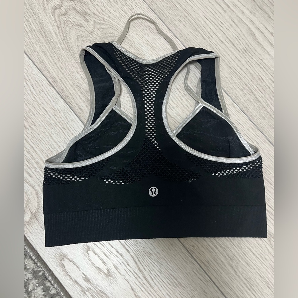 A set of 2 Lululemon sports bra size small black & purple. Can buy both or one